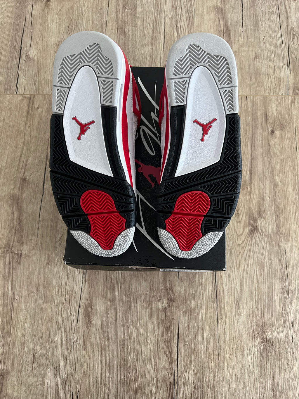 Jordan 4 Red Cement