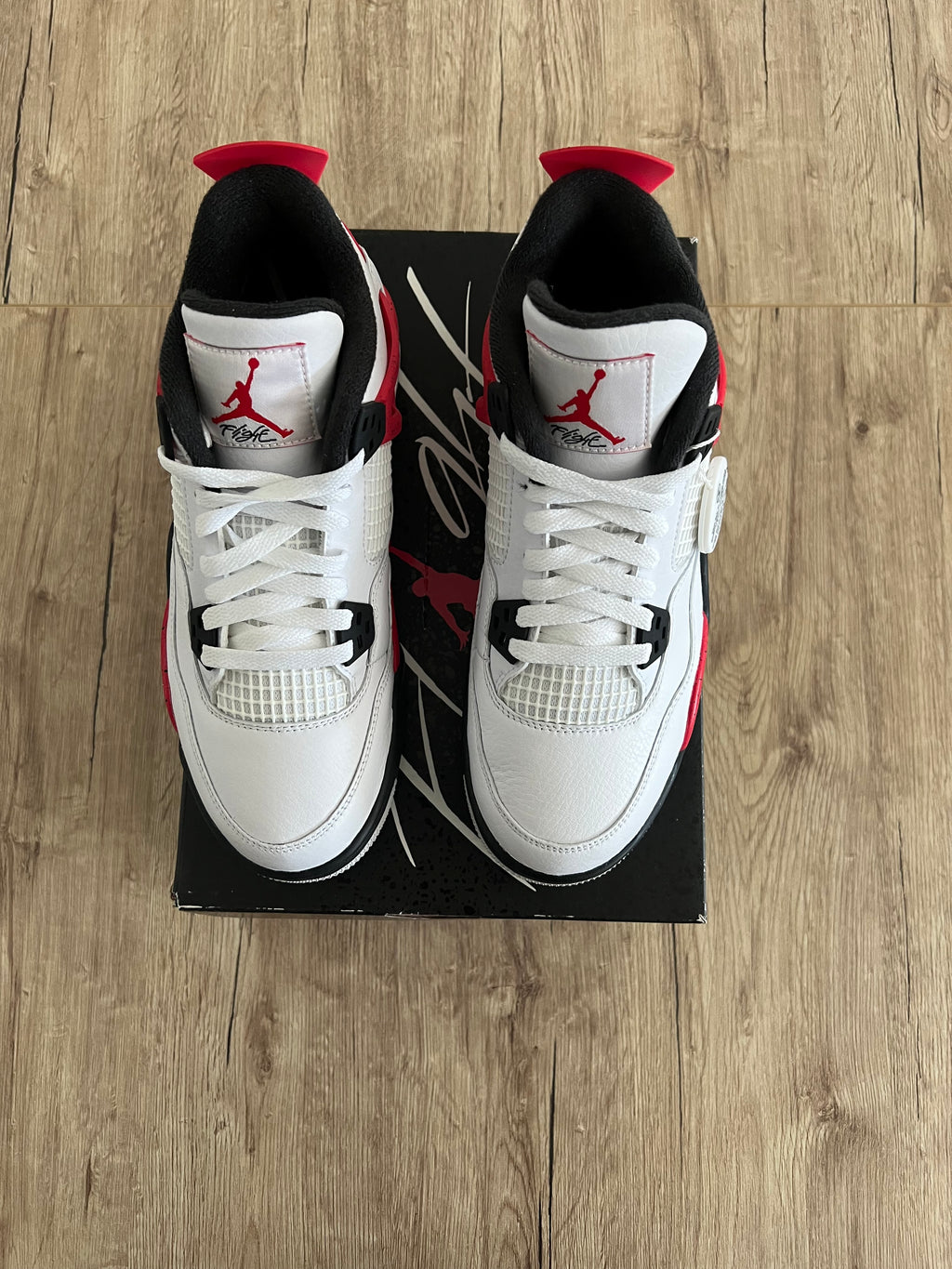 Jordan 4 Red Cement